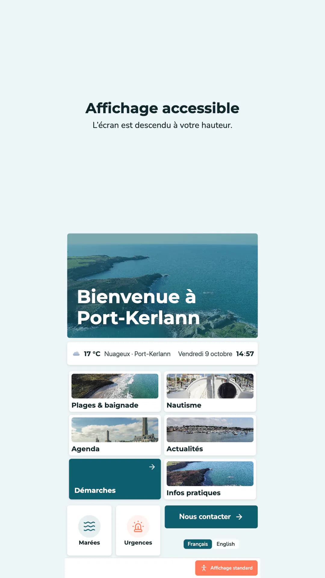 La même borne en affichage accessible : l’écran d’accueil entier est réduit et descendu dans la moitié basse, à hauteur d’une personne assise, sous le message « L’écran est descendu à votre hauteur » ; un bouton Affichage standard permet de revenir.
